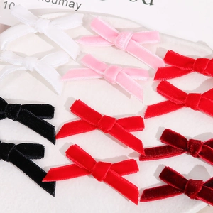 Close-up of colorful velvet handmade bow accessories for DIY jewelry and hair clips