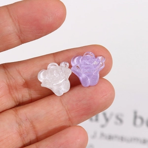 Translucent resin flower charms in white and purple with cat-eye effect for DIY jewelry