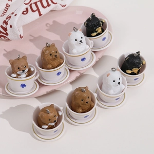 Miniature resin puppy figurines in elegant white teacups for DIY crafts and decor