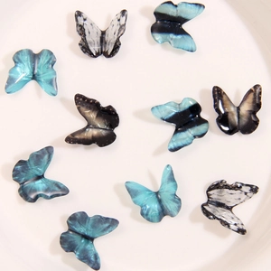 Mini 3D resin butterfly charms in blue and white for DIY jewelry and hair accessories