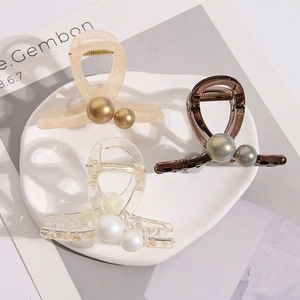 Tres elegantes pinzas para el cabello de resina de 18mm en tonos ámbar, claro y café