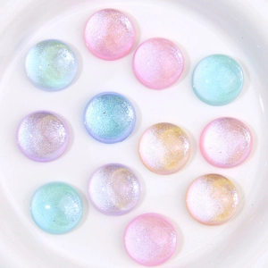 Mix of colorful round glitter resin cabochons with iridescent shimmer for DIY jewelry