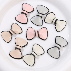 Elegant acrylic bow jewelry charms set in pastel colors for DIY phone cases and earrings
