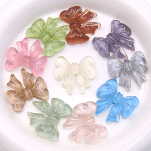Translucent resin bow charms in 10 assorted colors with pearl luster for DIY jewelry making