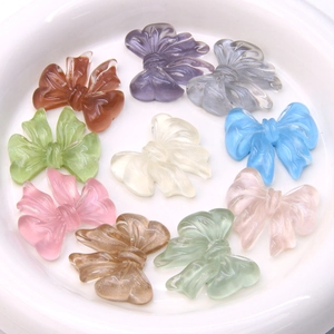 Translucent resin bow charms in various colors for DIY earrings and hair accessories