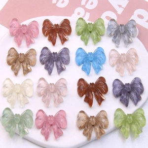 16-piece set of translucent resin bow charms for DIY jewelry and hair accessories