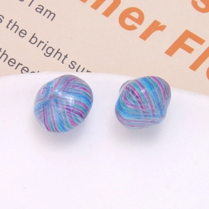 Macro shot of retro oil painting style striped resin beads for DIY earring accessories