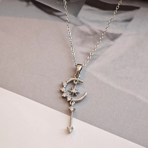 Silver star and moon tassel necklace with sparkling zircon moon and star pendant