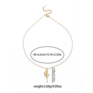 Gold star and moon tassel necklace with sparkling crystals and length specifications