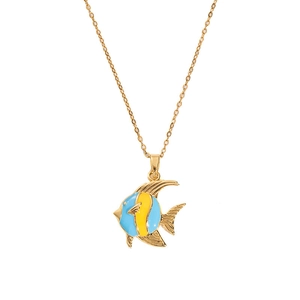 Detailed close-up of a golden fish pendant with blue and yellow enamel on a fine chain