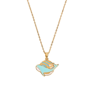 Detailed close-up of whale pendant necklace with blue and orange enamel in gold finish