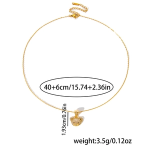 Detail showing S-STEEL stamp on gold bear necklace with 40+6cm chain length specs