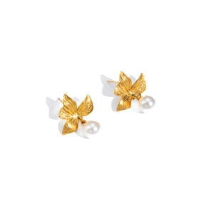 Detail of gold flower bow stud earrings with textured petals and dangling white pearl