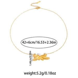Detailed view of gold butterfly wing necklace with pearl showing size 42+6cm and 5.2g weight