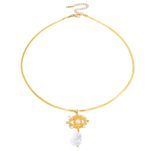 Golden snake chain necklace with pearl evil eye pendant and baroque pearl drop detail