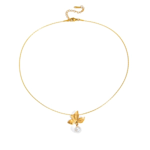 Detailed view of a gold flower petal pendant with a white pearl on a fine chain