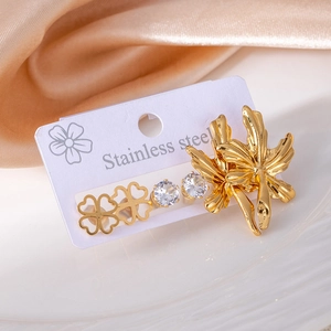 3-pair stainless steel earring set with orchid, clover and zircon studs on a tray