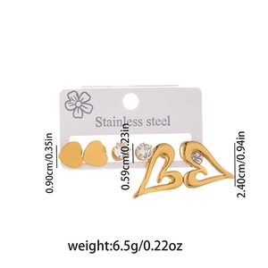 Three-piece stainless steel earring set featuring gold hearts and crystal studs