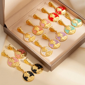 Detail of vintage queen portrait earrings with colorful enamel finish in a premium gift box
