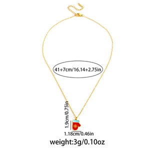 Détail du collier pendentif gant de Noël montrant la longueur de chaîne 41+7cm et les mesures