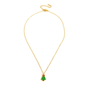 Détail du pendentif sapin de Noël en émail vert et nœud rouge sur une chaîne dorée