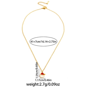 Macro view of gold Santa Claus pendant necklace with length and weight measurements