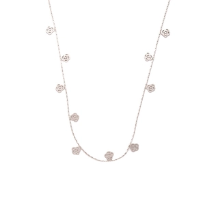 Detail view of silver stainless steel necklace with delicate hollow rose pendants