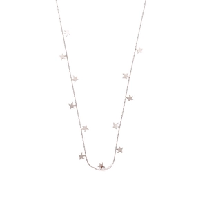 Close-up of a minimalist stainless steel choker necklace with delicate star charms