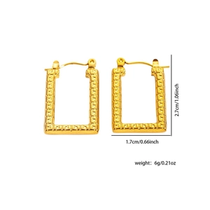 Detail view of gold rectangle earrings with Greek Key engraving and size dimensions