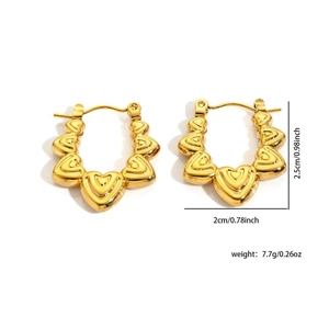 Detailed view of gold heart U-shaped earrings with size 2.5cm by 2cm and weight 7.7g
