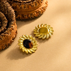 Boucles d'oreilles rétro tournesol doré avec centre léopard ambré et motif de pétales
