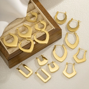Collection of gold geometric stainless steel earrings with heart and teardrop shapes