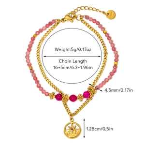Detail of bohemian double-layer titanium steel bracelet with natural pink beads and star charm