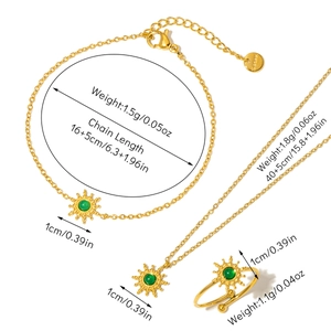 Detailed specs of gold sun jewelry set with green stone, showing size and weight