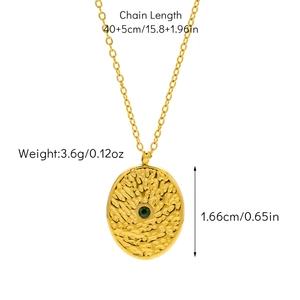 Detail showing dimension and weight of gold emerald gemstone necklace with hammered texture