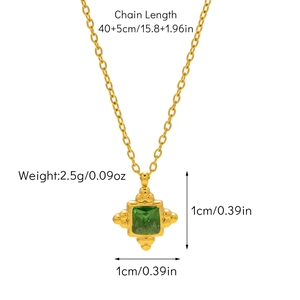 Detail view of gold emerald cross necklace with 40+5cm chain length and weight info