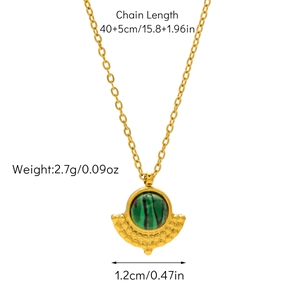 Detail showing 18K gold fan-shaped pendant with emerald stone and dimensions scale