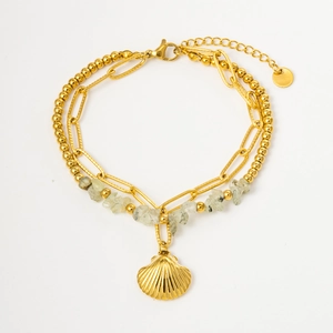 Gold bohemian layered bracelet with natural green stone chips and a shell pendant