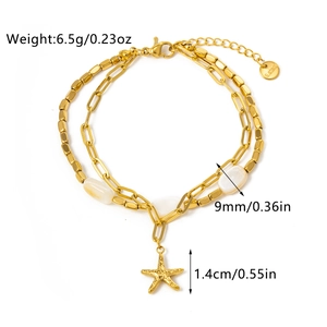 Detail of gold stainless steel double-layered bracelet with starfish and shell beads
