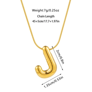 Detail view of gold balloon J letter pendant necklace with specific product dimensions