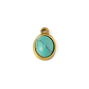 Detail of oval turquoise pendant with natural veins in a gold-plated stainless steel setting