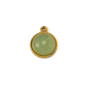 Close-up of green natural stone pendant with gold beaded bezel for DIY jewelry making