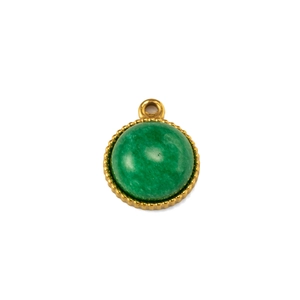 Macro detail of round gold-plated pendant with green natural stone inlay and beaded edge