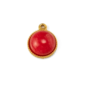 Close-up of a gold-plated stainless steel circular pendant with a red stone inlay