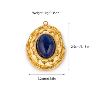 Detail showing dimensions of vintage oval lapis lazuli pendant with gold hammered finish