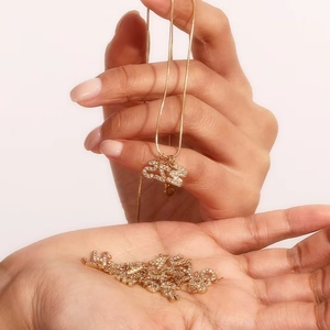 Gold plated 2024 number pendant necklace with pave crystals on a snake chain
