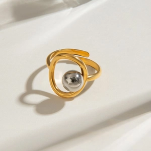 Minimalist gold and silver two-tone stainless steel open ring with a polished metal bead