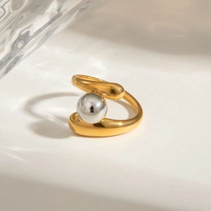 Minimalist 18k gold and silver two-tone stainless steel crossover ring with metal ball