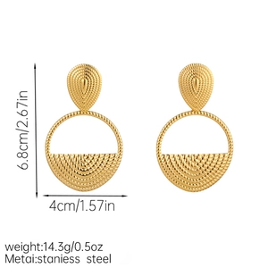 Detailed view of gold textured stainless steel earrings with measurements and weight