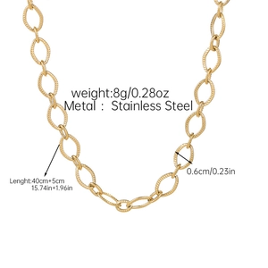 Detailed close-up of 18k gold-plated stainless steel chain with textured oval links